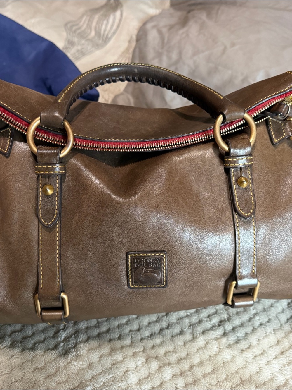 Dooney & Bourke Brown Leather Duffel with Red Zipper Trim